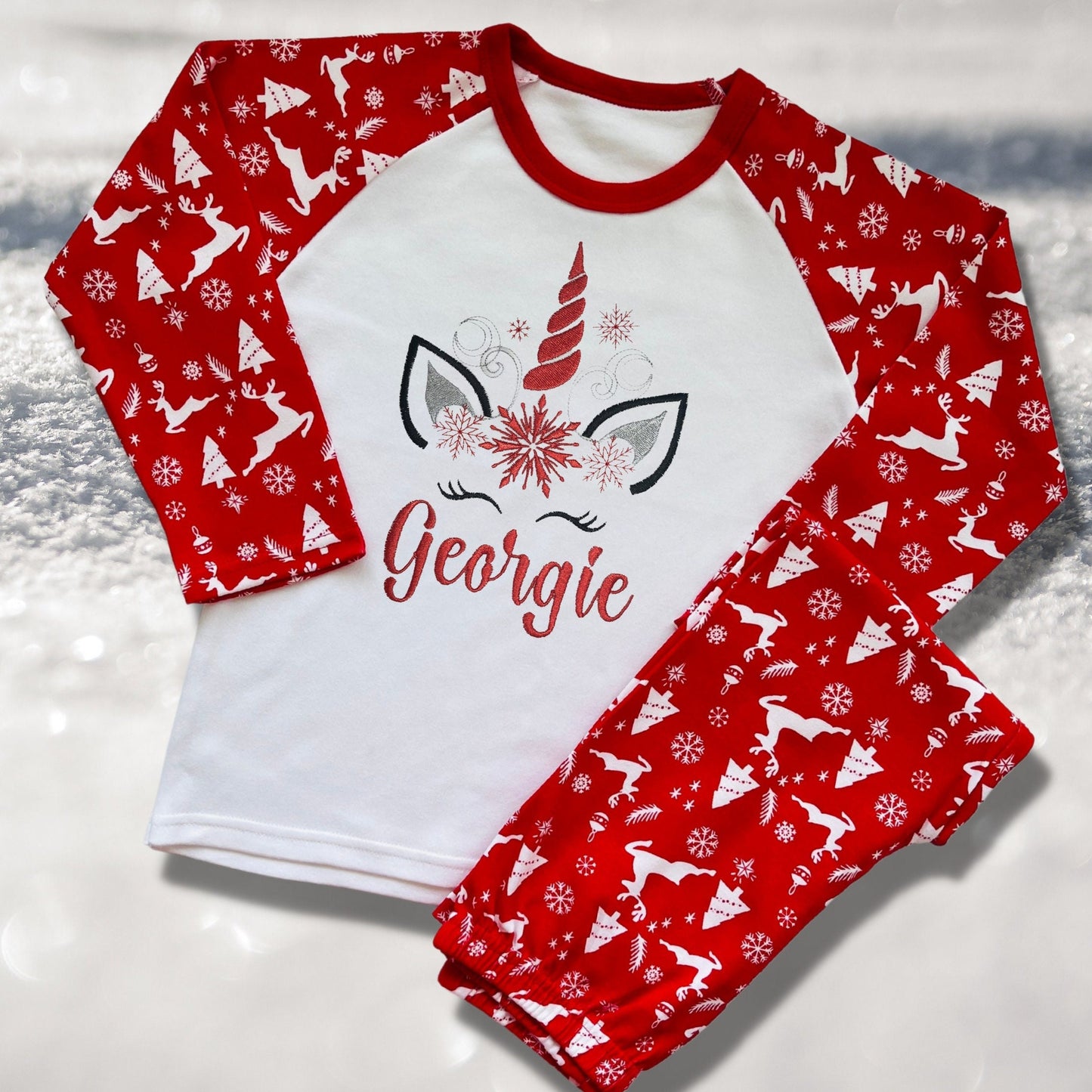 Personalised Embroidered Christmas Childrens Pyjamas and Rompersuits with a Super Cute Unicorn Xmas Designs