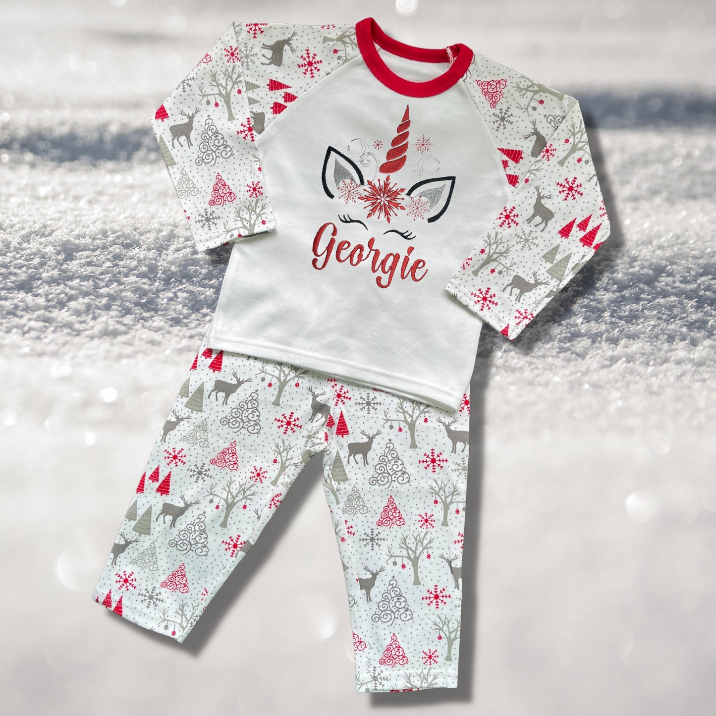 Personalised Embroidered Christmas Childrens Pyjamas and Rompersuits with a Super Cute Unicorn Xmas Designs