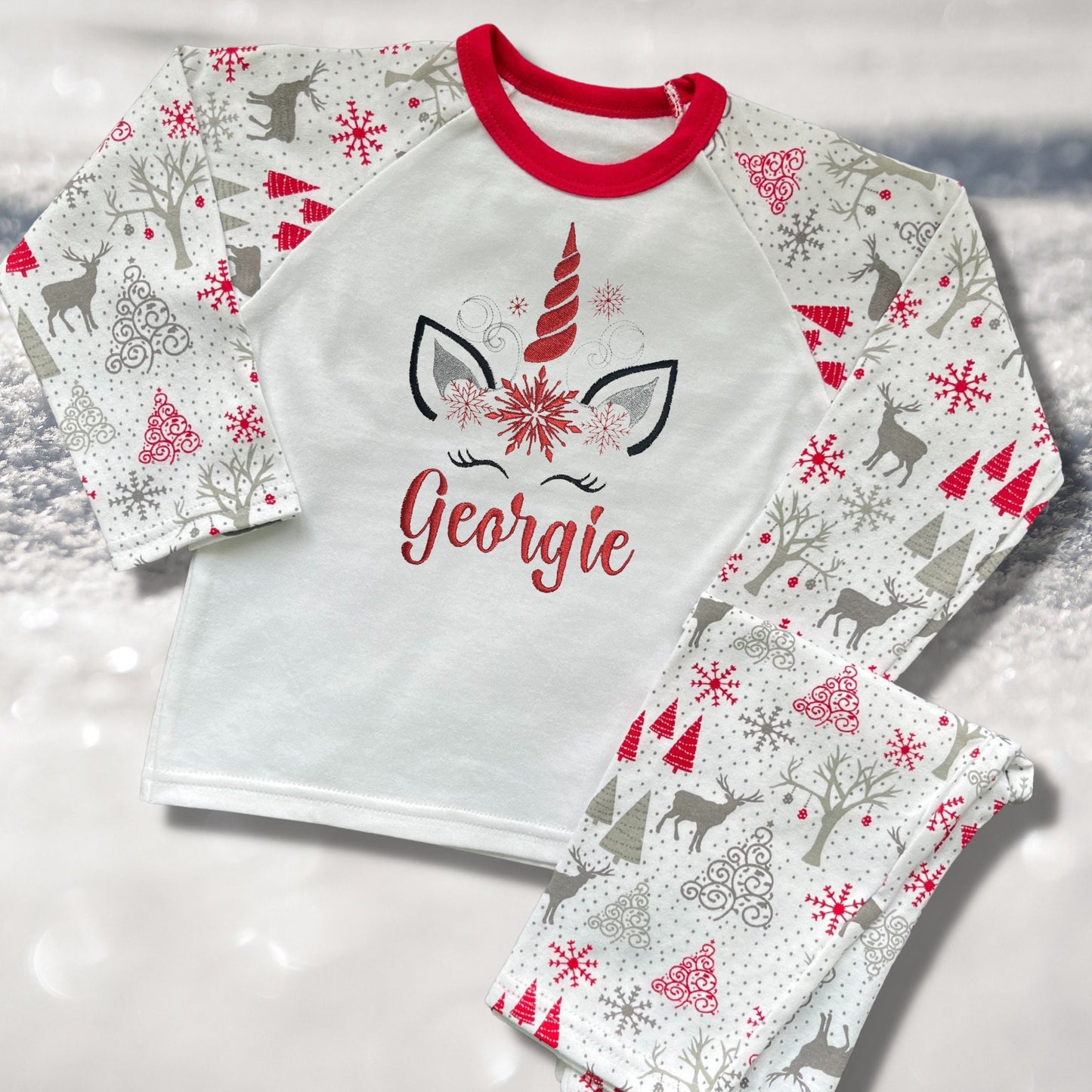 Personalised Embroidered Christmas Childrens Pyjamas and Rompersuits with a Super Cute Unicorn Xmas Designs