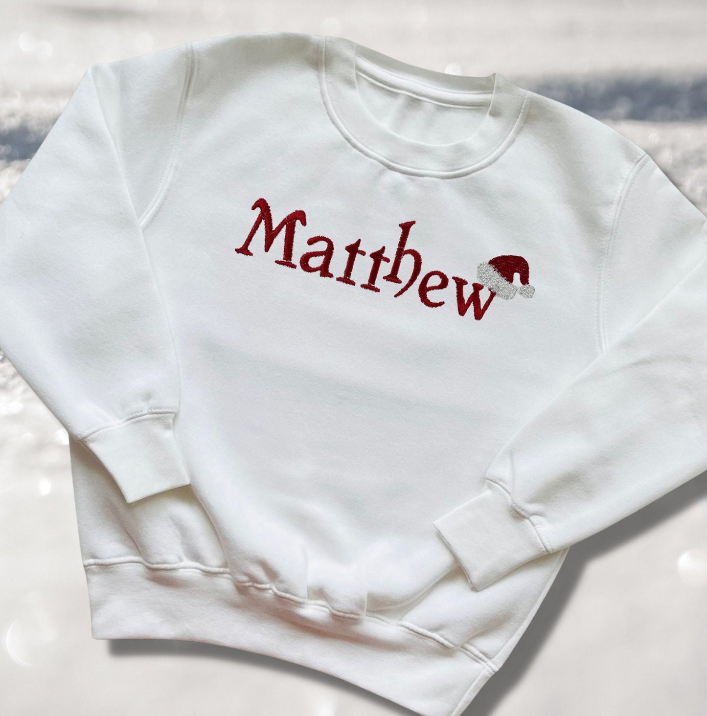 Personalised Embroidered Childrens Christmas Top. Cute Design with Name and Santa Hat. Perfect for the Christmas Season. Choice of Garment