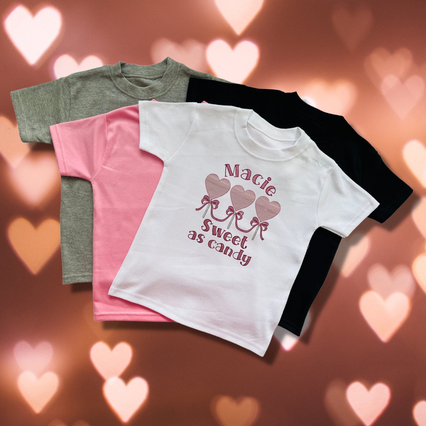 Embroidered Childrens Valentine's Shirt. Cute Row of Lollipop Hearts Saying 'sweet as candy' and Personalised with Child's Name.