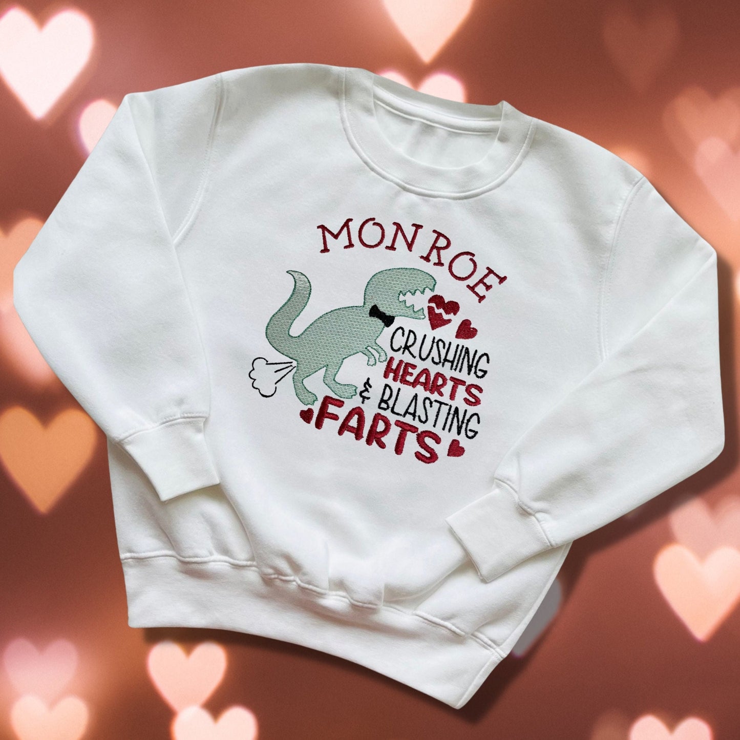 Embroidered Children's Valentine's Shirt. Cheeky Dinosaur Design Saying ''Crushing Hearts & Blasting Farts" Personalised with Child's Name.