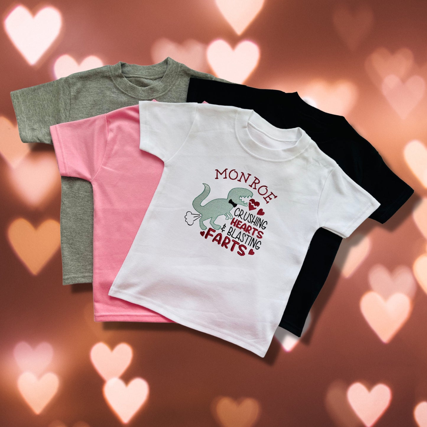 Embroidered Children's Valentine's Shirt. Cheeky Dinosaur Design Saying ''Crushing Hearts & Blasting Farts" Personalised with Child's Name.