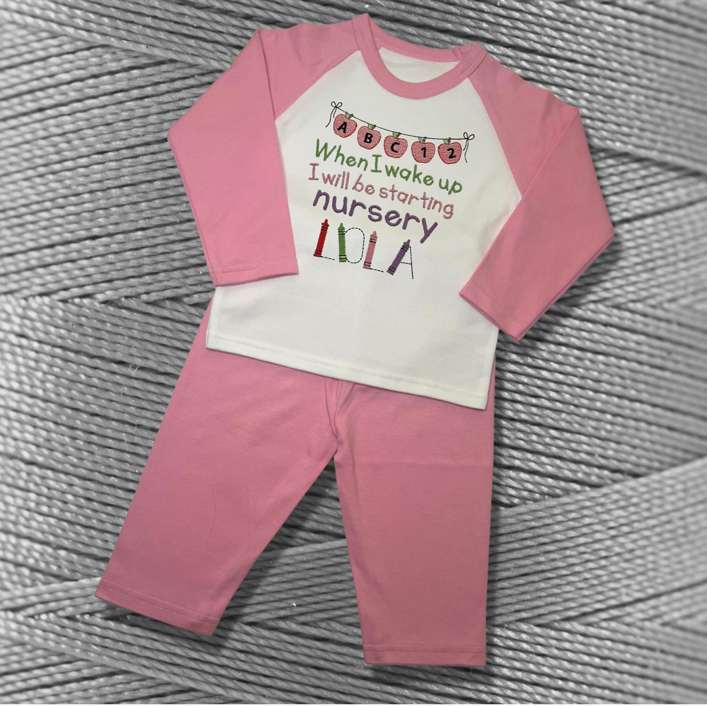 Childrens Personalised Embroidered Pyjamas Saying 'When I wake up I will be starting Nursery'. Cute Apple Banner Design with Child's Name.