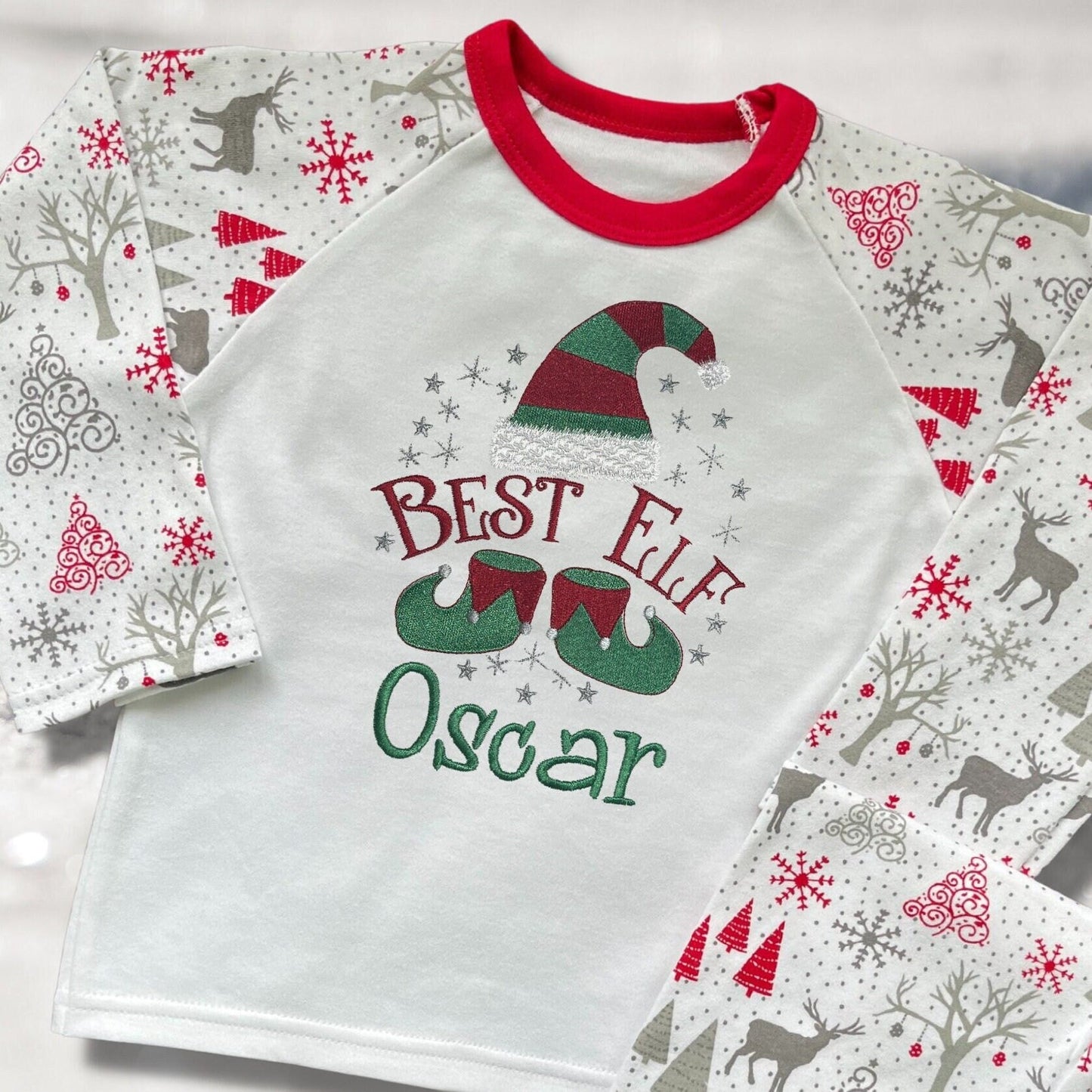 Personalised Embroidered Christmas Childrens Pyjamas and Rompersuits with a Cute 'Best Elf' Christmas Design