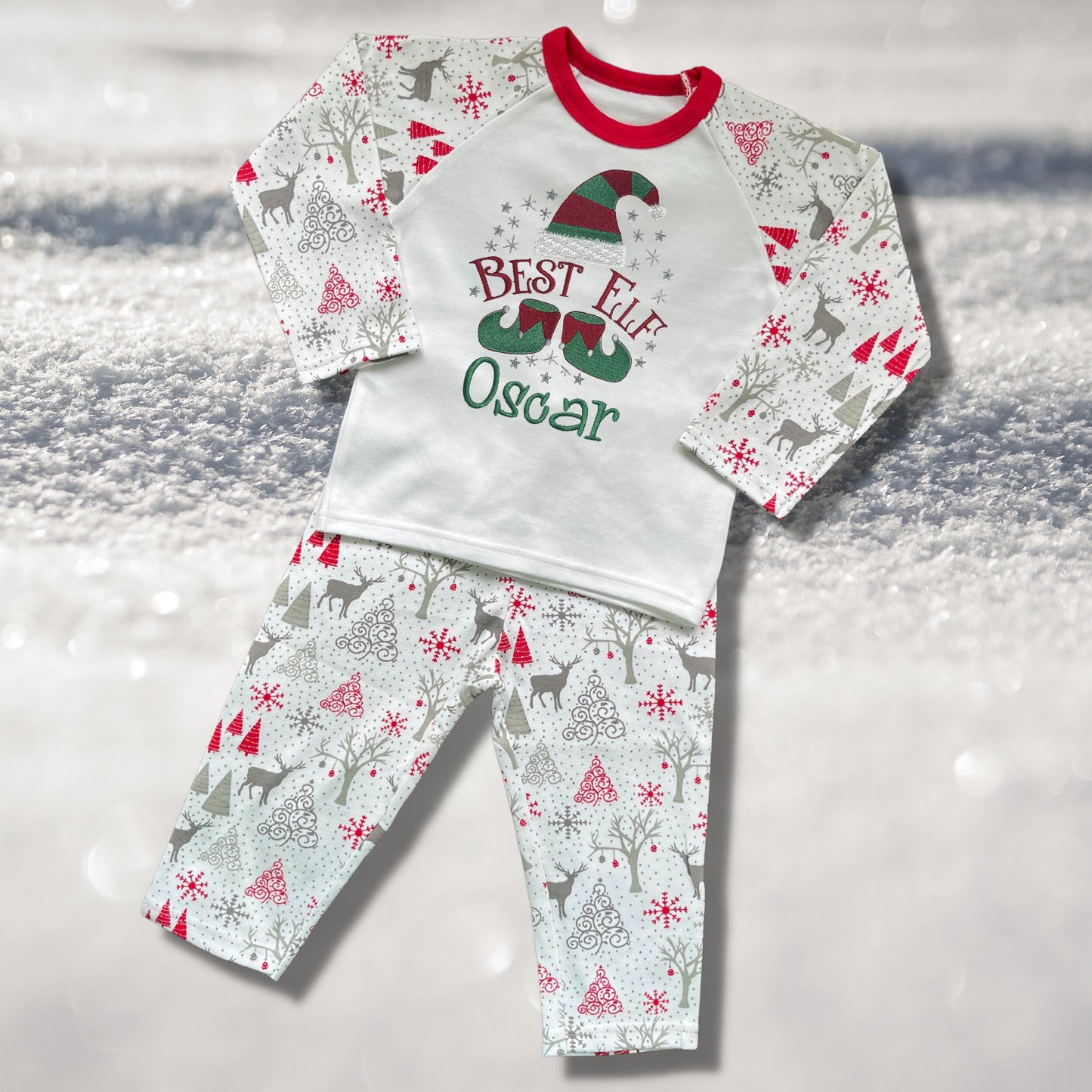 Personalised Embroidered Christmas Childrens Pyjamas and Rompersuits with a Cute 'Best Elf' Christmas Design