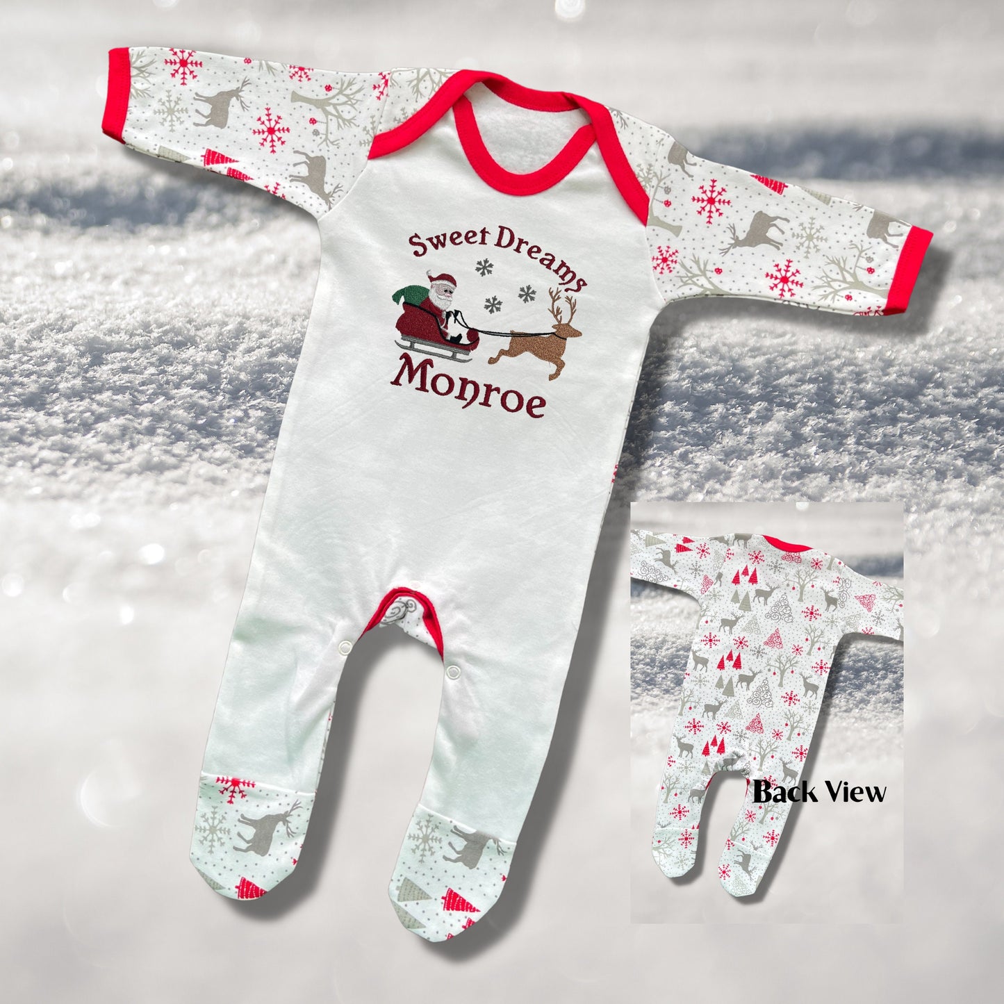 Personalised Embroidered Christmas Childrens Pyjamas and Rompersuits with Santa, his Sleigh and a Reindeer. With the Words 'Sweet Dreams'.