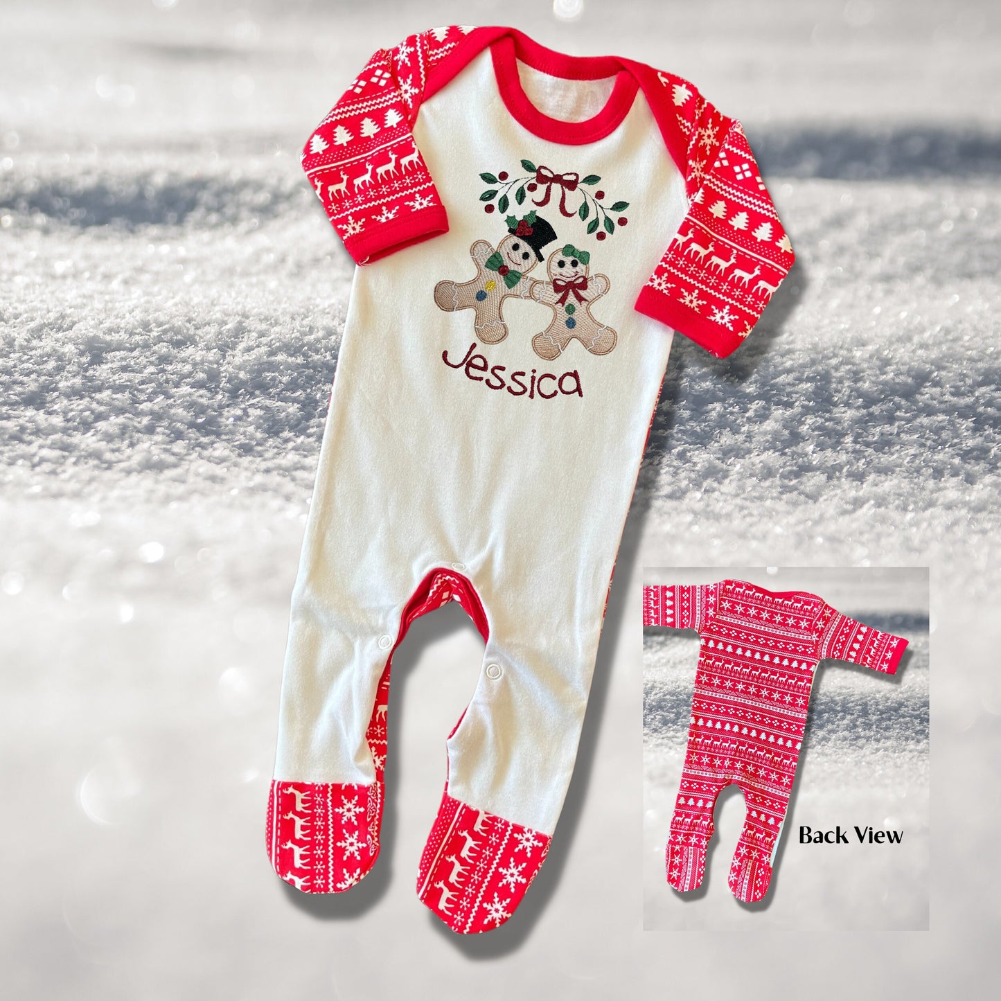 Personalised Embroidered Christmas Childrens Pyjamas and Rompersuits with the Cutest Gingerbread Girl and Boy Holding Hands Under a Garland.