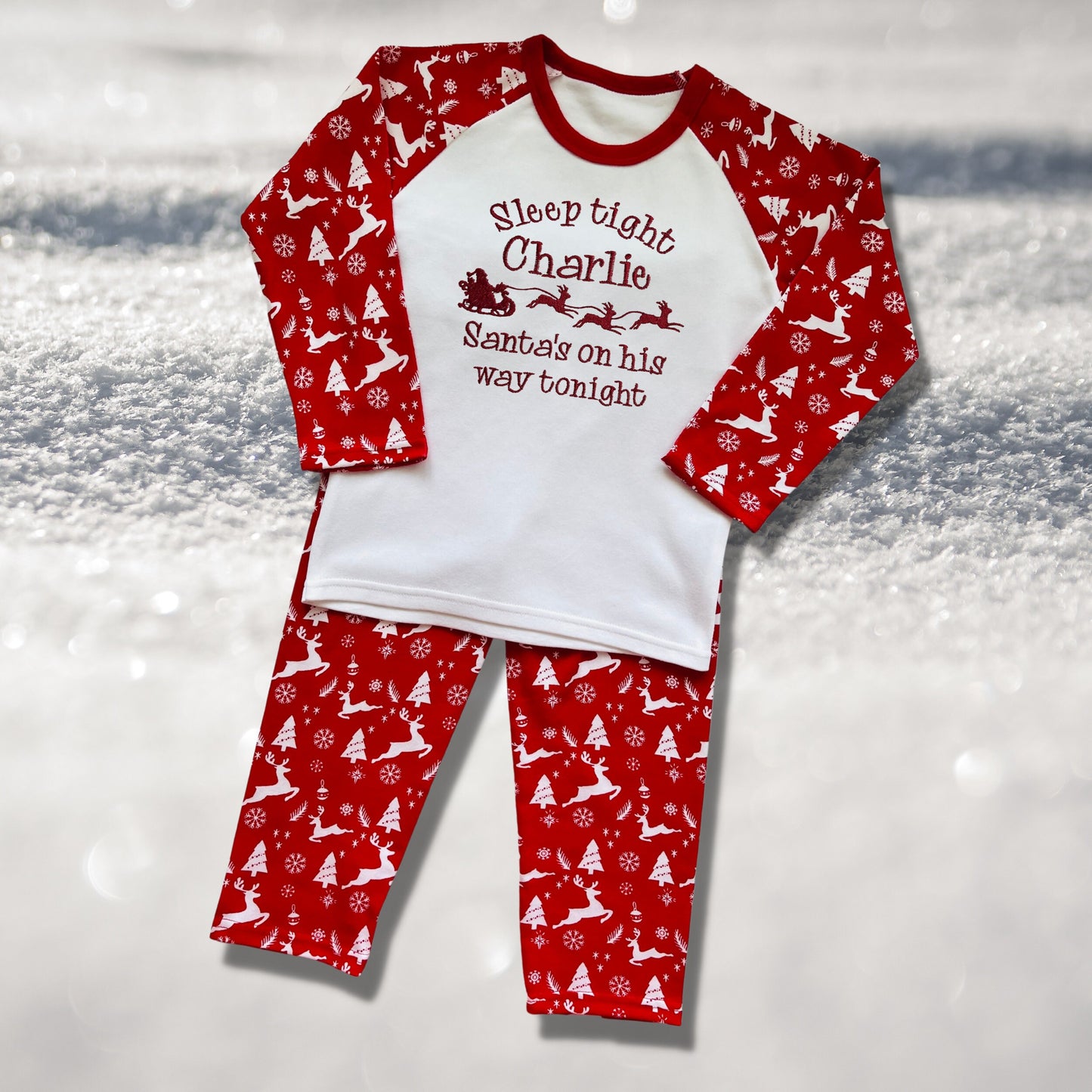 Personalised Embroidered Christmas Childrens Pyjamas and Rompersuits. Santa and His Sleigh. 'Santa's on his way'. A Perfect Christmas Gift