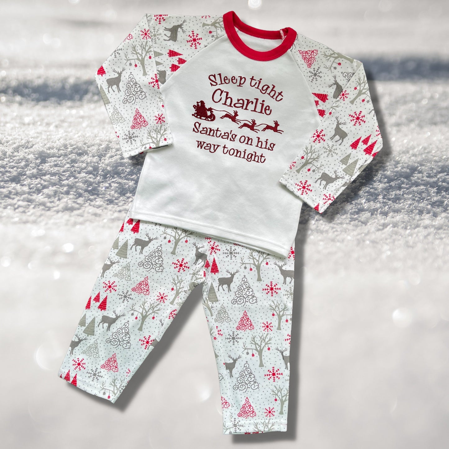 Personalised Embroidered Christmas Childrens Pyjamas and Rompersuits. Santa and His Sleigh. 'Santa's on his way'. A Perfect Christmas Gift