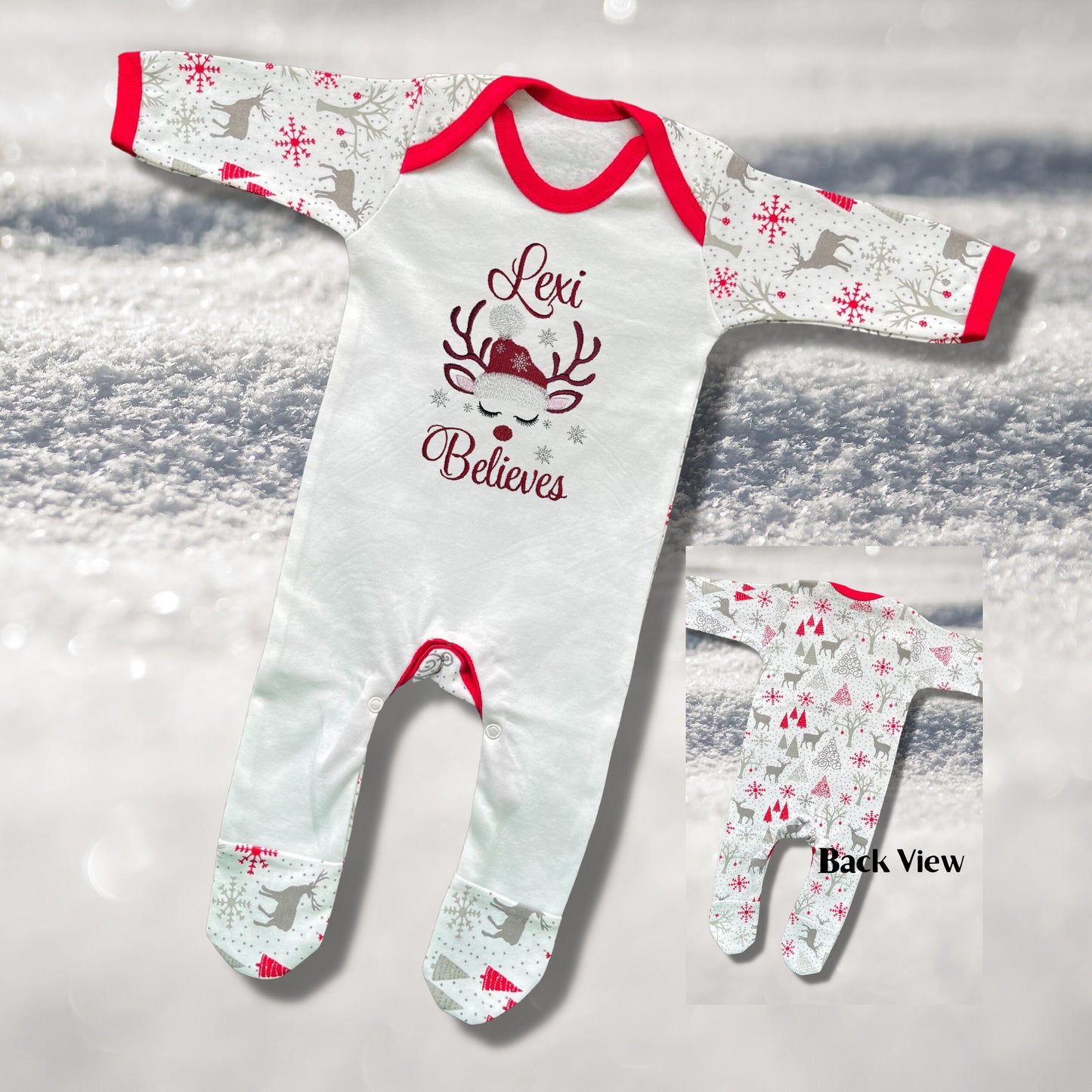 Personalised Embroidered Christmas Childrens Pyjamas and Rompersuits with a Gorgeous Winter Reindeer and the Words 'Believes' under the Name
