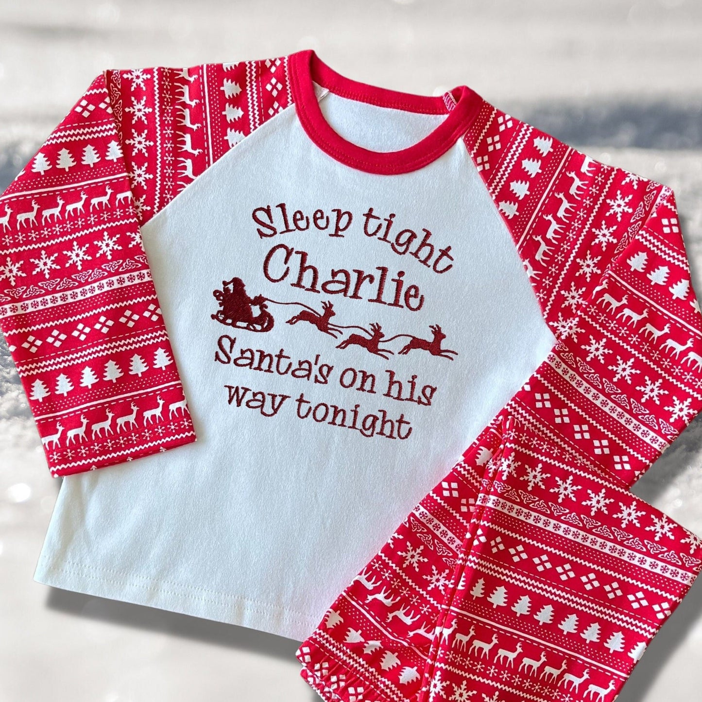 Personalised Embroidered Christmas Childrens Pyjamas and Rompersuits. Santa and His Sleigh. 'Santa's on his way'. A Perfect Christmas Gift