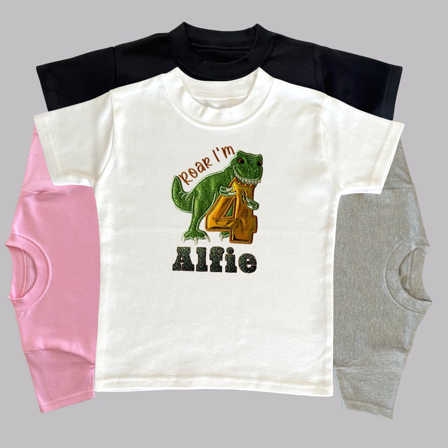 Personalised Embroidered Children's Birthday Top. Embroidered Applique Dinosaur Personalised with Age and Name in a Scaley Font Perfect Gift