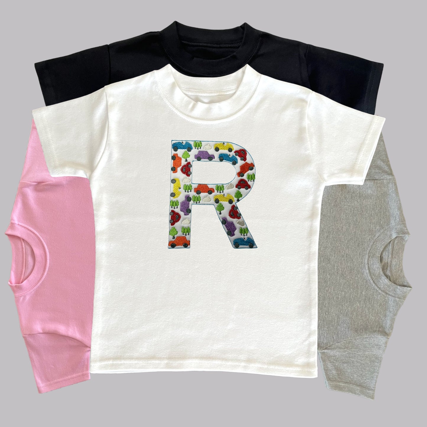 Personalised Embroidered Children's Top. Colourful Cars Make Up the Letter of the Alphabet. A Perfect Gift for Car Fans.