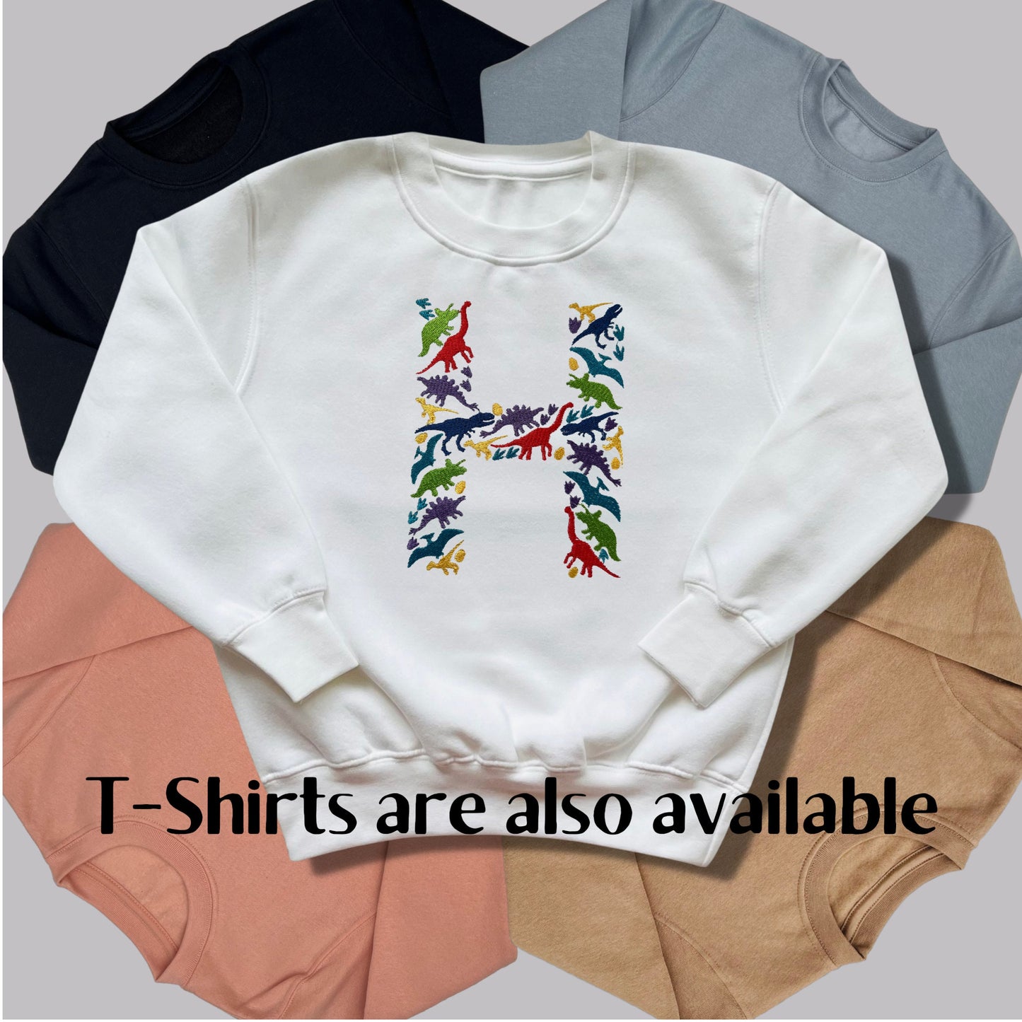Personalised Embroidered Children's Dinosaur Top. Colourful Dinosaur's Make Up the Letter of the Alphabet. A Perfect Gift for Dinosaur Fans.