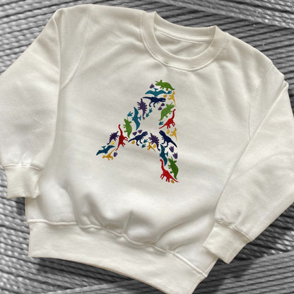 Personalised Embroidered Children's Dinosaur Top. Colourful Dinosaur's Make Up the Letter of the Alphabet. A Perfect Gift for Dinosaur Fans.