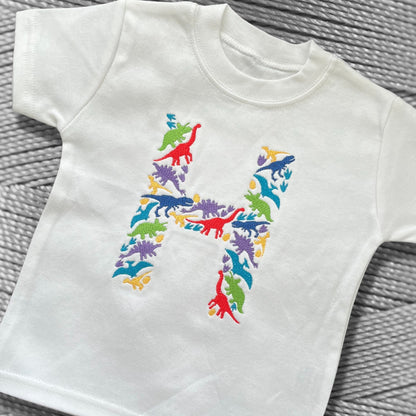 Personalised Embroidered Children's Dinosaur Top. Colourful Dinosaur's Make Up the Letter of the Alphabet. A Perfect Gift for Dinosaur Fans.