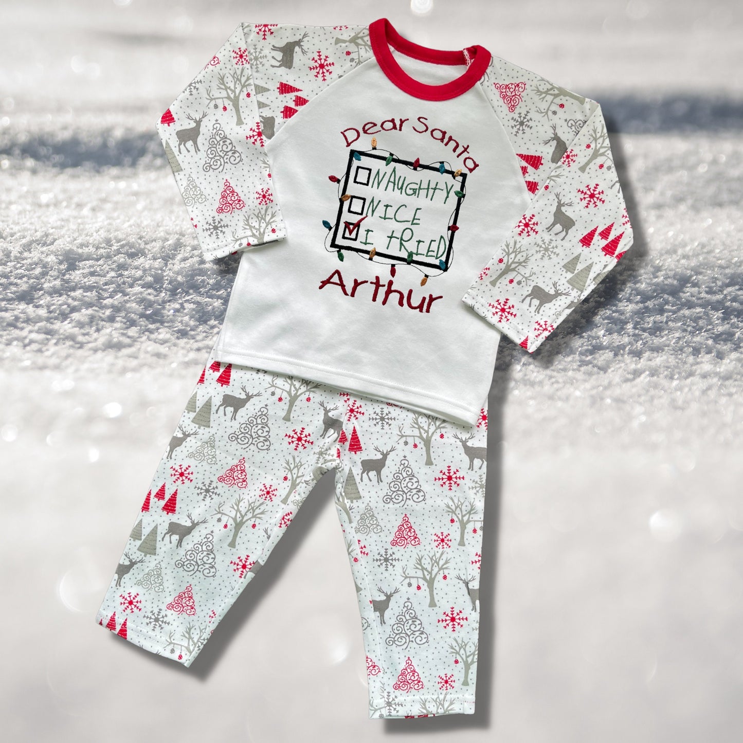 Personalised Embroidered Christmas Childrens Pyjamas and Rompersuits with a Sweet Note to Dear Santa Saying 'Naughty, Nice, I Tried'.