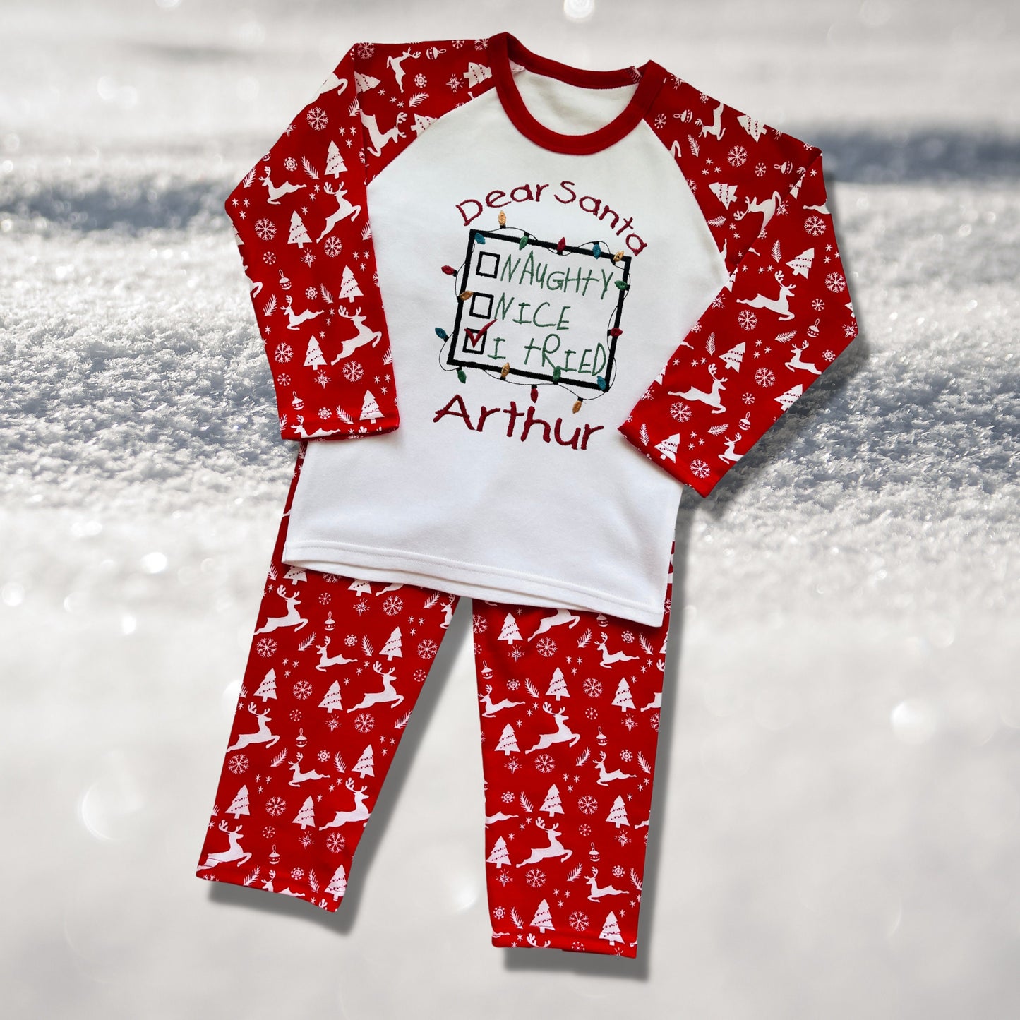Personalised Embroidered Christmas Childrens Pyjamas and Rompersuits with a Sweet Note to Dear Santa Saying 'Naughty, Nice, I Tried'.
