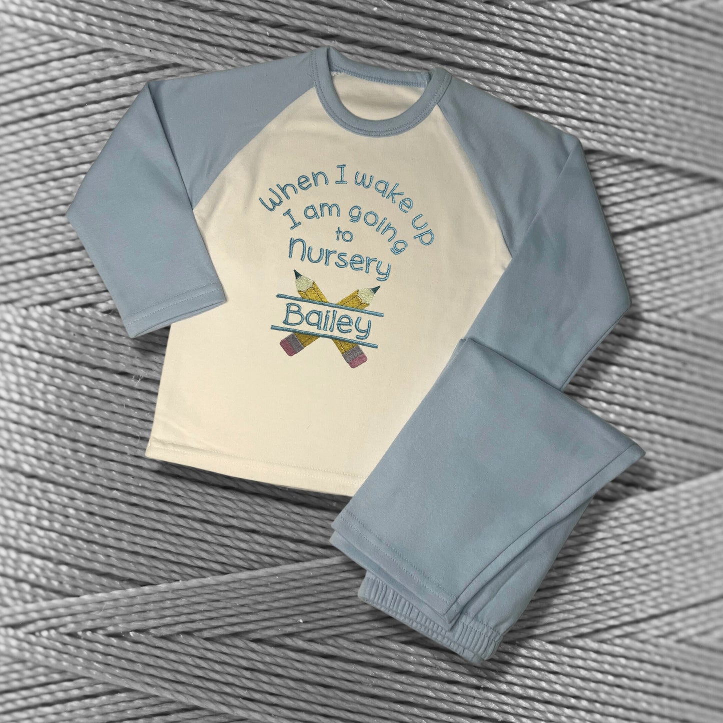 Childrens Personalised Embroidered Pyjamas Saying 'When I wake up I am going to Nursery'. Cute Pencil Design with Child's Name.