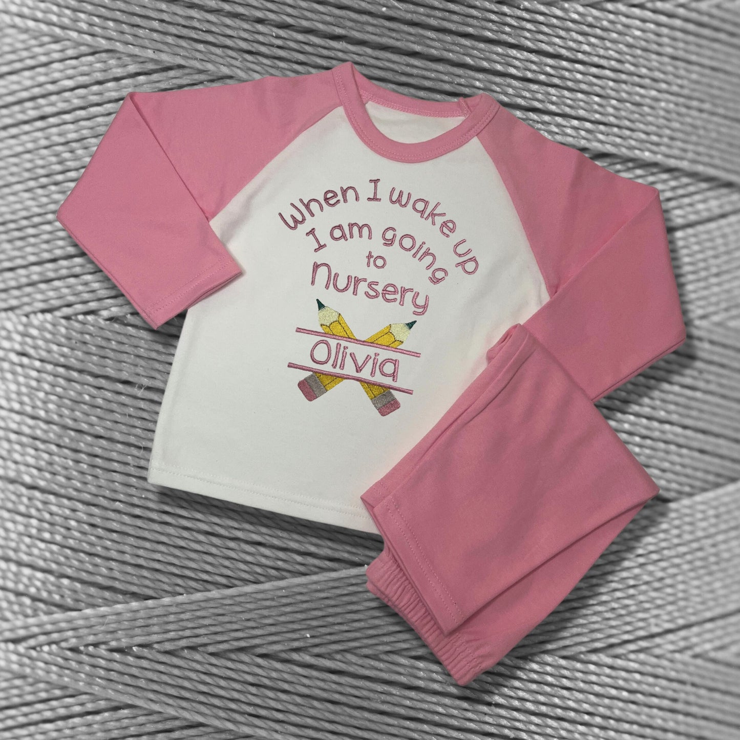 Childrens Personalised Embroidered Pyjamas Saying 'When I wake up I am going to Nursery'. Cute Pencil Design with Child's Name.