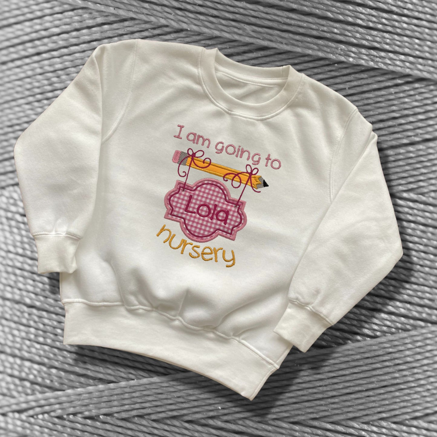 Personalised Embroidered 'I am going to nursery' Top with Blue or Pink Gingham Design. Personalised with Child's Name. Choice of Garment