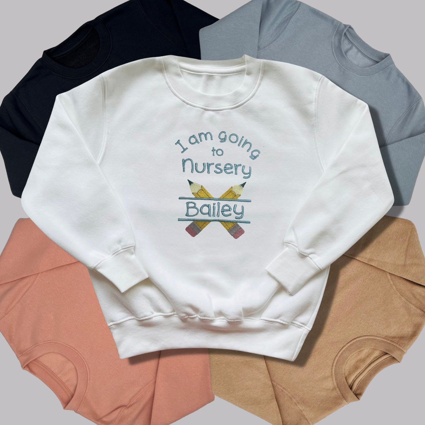 Personalised Embroidered 'I am going to nursery' Top. Cute Pencil Design in Blue or Pink Personalised with Child's Name. Choice of Garment.