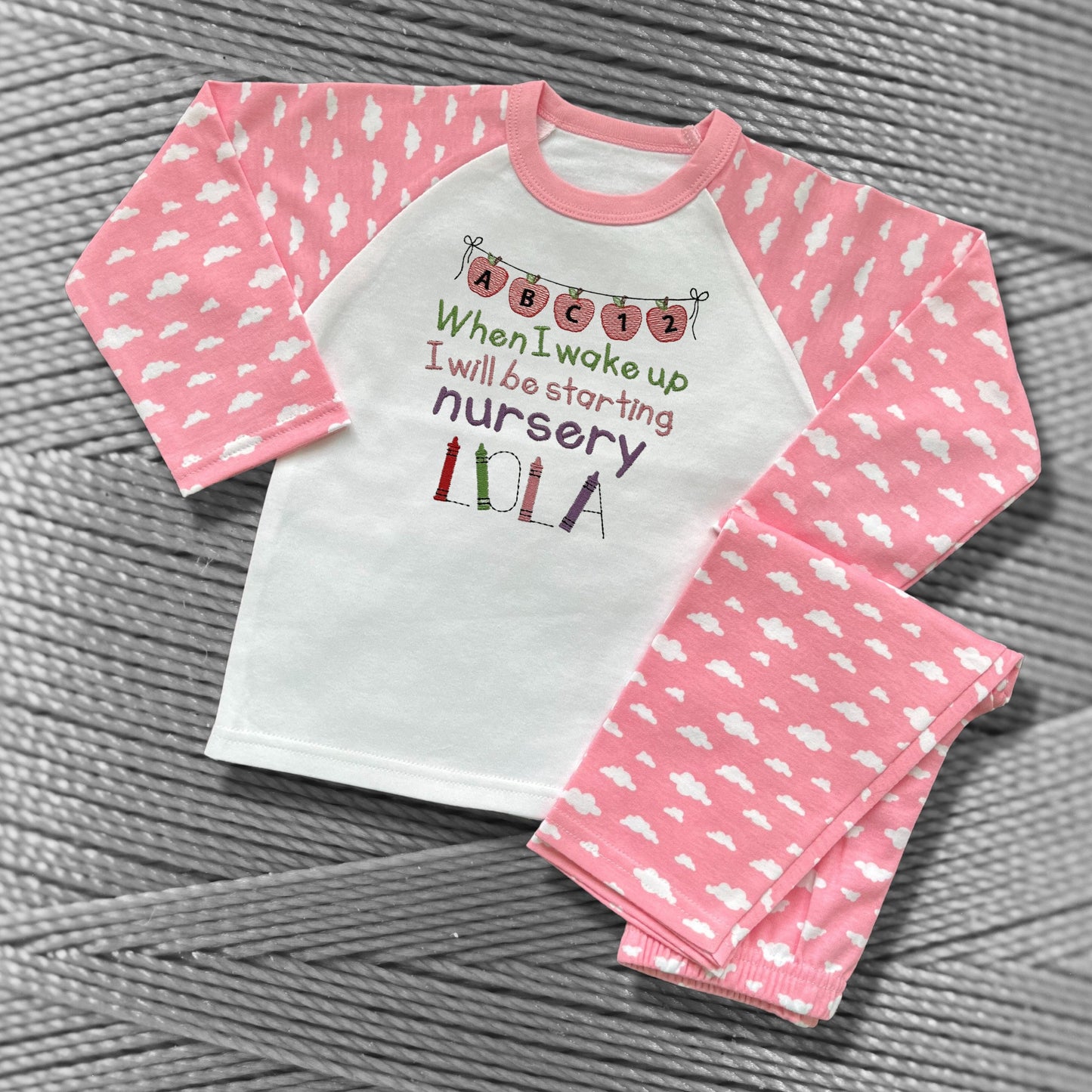 Childrens Personalised Embroidered Pyjamas Saying 'When I wake up I will be starting Nursery'. Cute Apple Banner Design with Child's Name.
