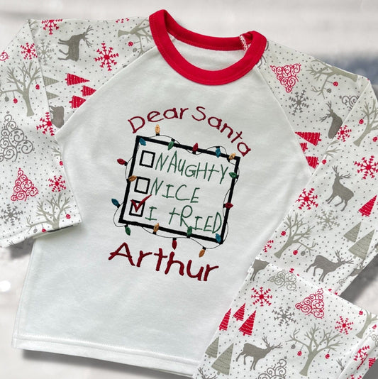 Personalised Embroidered Christmas Childrens Pyjamas and Rompersuits with a Sweet Note to Dear Santa Saying 'Naughty, Nice, I Tried'.