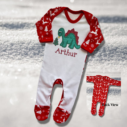 Personalised Embroidered Christmas Childrens Pyjamas and Rompersuits. Cute Dinosaur Putting a Star on his Tree. Finished with Child's Name