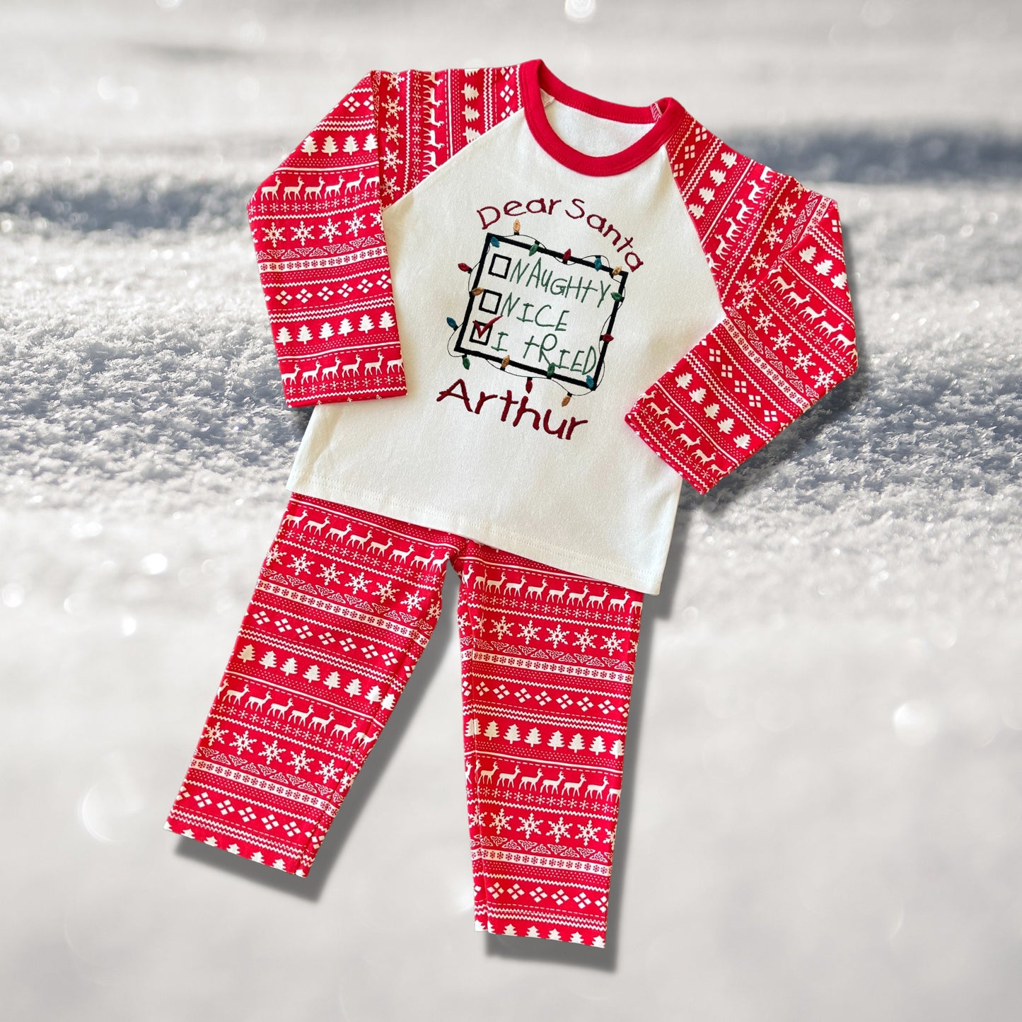 Personalised Embroidered Christmas Childrens Pyjamas and Rompersuits with a Sweet Note to Dear Santa Saying 'Naughty, Nice, I Tried'.