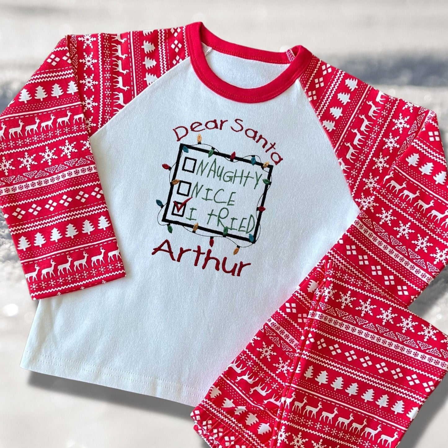 Personalised Embroidered Christmas Childrens Pyjamas and Rompersuits with a Sweet Note to Dear Santa Saying 'Naughty, Nice, I Tried'.