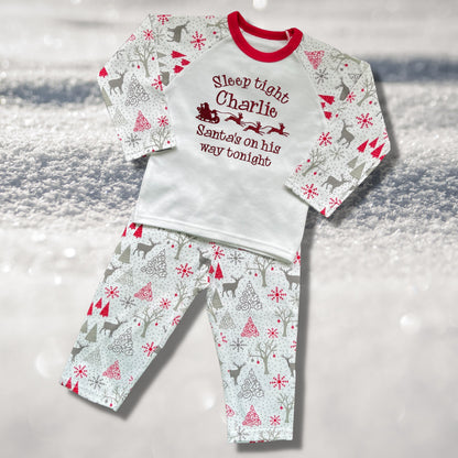 Personalised Embroidered Christmas Childrens Pyjamas and Rompersuits. Santa and His Sleigh. 'Santa's on his way'. A Perfect Christmas Gift