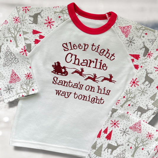 Personalised Embroidered Christmas Childrens Pyjamas and Rompersuits. Santa and His Sleigh. 'Santa's on his way'. A Perfect Christmas Gift