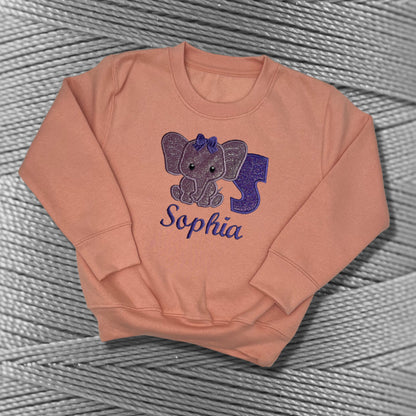 Children's Personalised Embroidered Top With a Cute Elephant Design. A Beautiful Design Using Glittery Purples with Child's Name and Initial