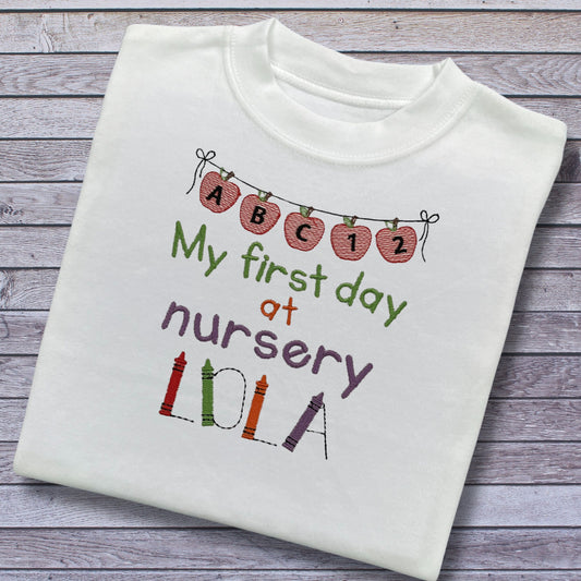 Personalised Embroidered 'My first day at nursery' Tops. Personalised with Child's Name in a Cute Colourful Crayon Font. Choice of Garment