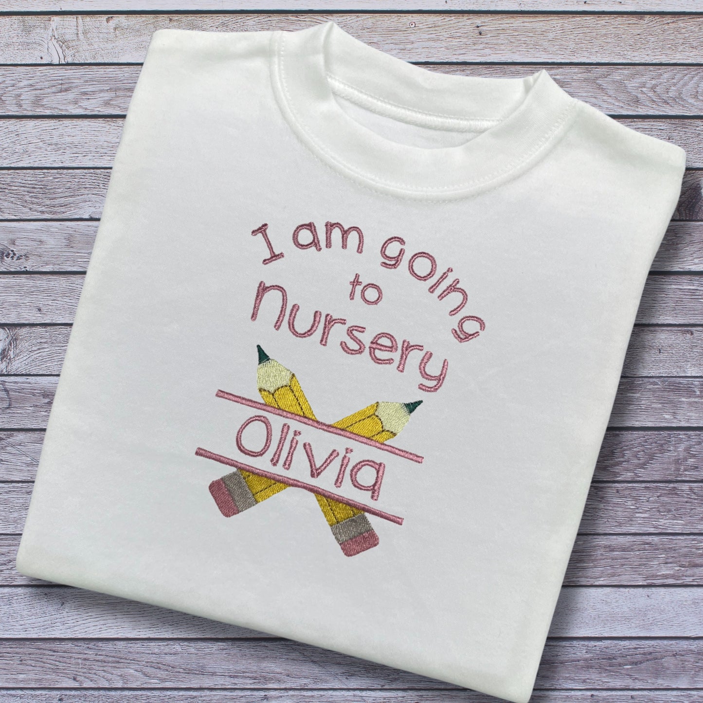Personalised Embroidered 'I am going to nursery' Top. Cute Pencil Design in Blue or Pink Personalised with Child's Name. Choice of Garment.